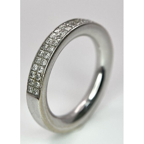 100 - A Six Ring 18K White Gold Bonanza! To include: (1) Diamond half eternity with centre diamond - Size ... 