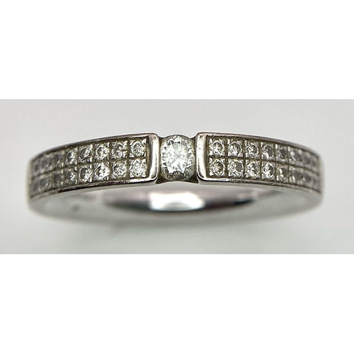 100 - A Six Ring 18K White Gold Bonanza! To include: (1) Diamond half eternity with centre diamond - Size ... 