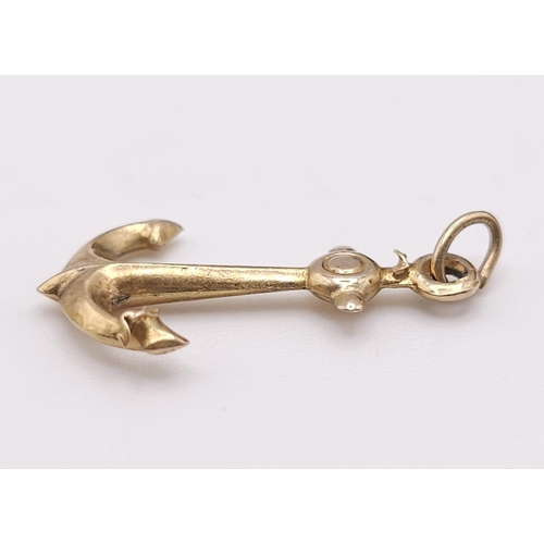 1056 - A 9K YELLOW GOLD ANCHOR CHARM. TOTAL WEIGHT 0.6G