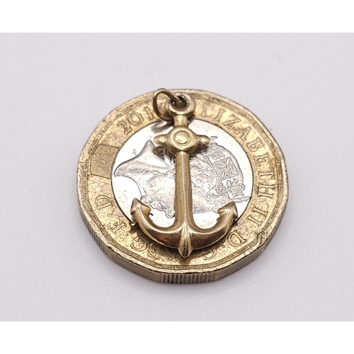 1056 - A 9K YELLOW GOLD ANCHOR CHARM. TOTAL WEIGHT 0.6G