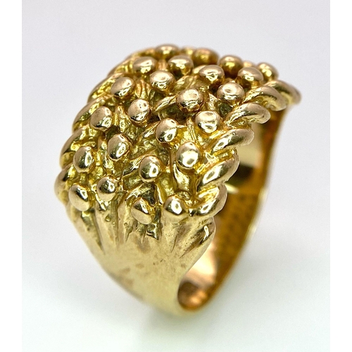 277 - A 9K GOLD KEEPER RING . 9.2gms   size S