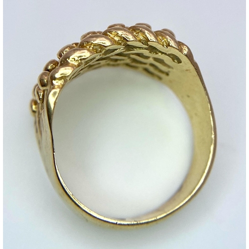 277 - A 9K GOLD KEEPER RING . 9.2gms   size S