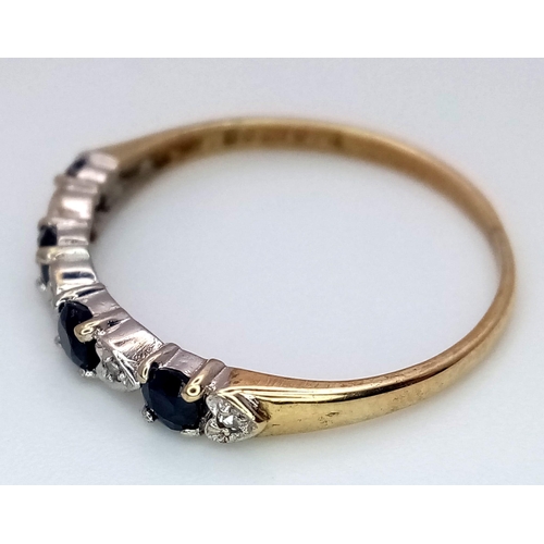 509 - A 9K YELLOW GOLD DIAMOND & SAPPHIRE RING. TOTAL WEIGHT 1.1G. SIZE N