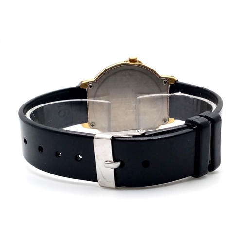 635 - A Lorus Mickey Mouse Happy Birthday Quartz Watch. Black leather strap. Gilded case - 33mm. Mickey Mo... 