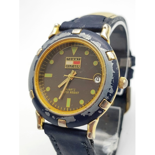 898 - TOMMY HILFIGER WATCH REQUIRES NEW BATTERY AF