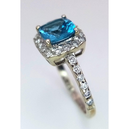 1014 - A 9K WHITE GOLD DIAMOND & LONDON BLUE TOPAZ RING. TOTAL WEIGHT 2.1G. SIZE I