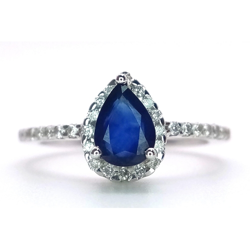 1018 - 18K WHITE GOLD DIAMOND & SAPPHIRE  RING, WITH A  PEAR SHAPED SAPPHIRE CENTRE AND SURROUNDED BY DIAMO... 