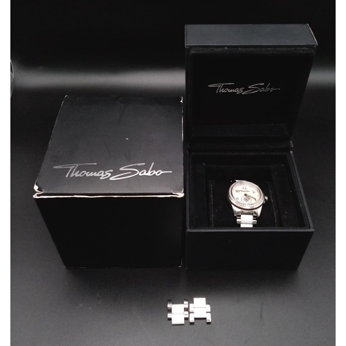 683 - A Very Good Condition Ladies Thomas Sabo, Clear Stone Set Bezel, Quartz Bracelet Watch. 36mm Includi... 