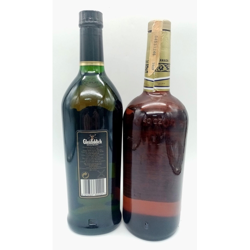 771 - Two Large Bottles of Famous Brand Whisky: A one litre boxed bottle of 12 year old Glenfiddich and a ... 