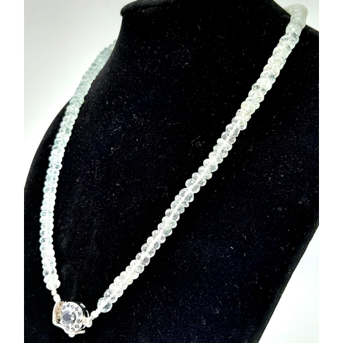 1430 - A 158ctw Aquamarine Necklace with Sapphire Clasp set in 925 Silver. 42cm length. 30.87g total weight... 