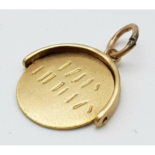 1007 - A 9K YELLOW GOLD HAPPY BIRTHDAY SPINNER CHARM. TOTAL WEIGHT 1G