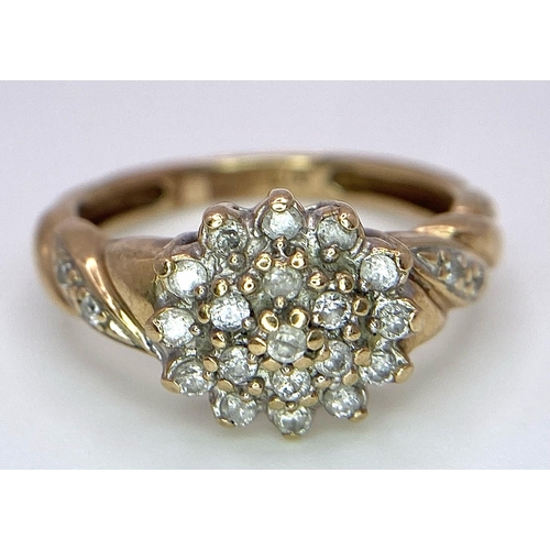 1042 - A 9K YELLOW GOLD 0.25CT  DIAMOND CLUSTER RING. TOTAL WEIGHT 2.2G. SIZE J