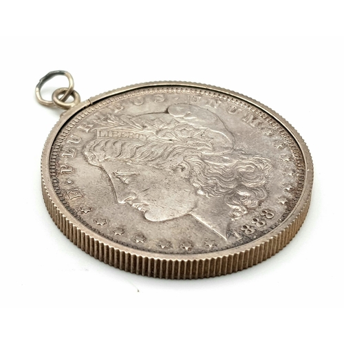 572 - AN 1888 SILVER DOLLAR FROM THE U.S.A. IN PENDANT SETTING .  30gms