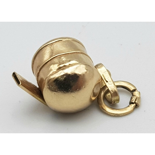 656 - A 9K YELLOW GOLD WHISTLE CHARM. TOTAL WEIGHT 0.8G