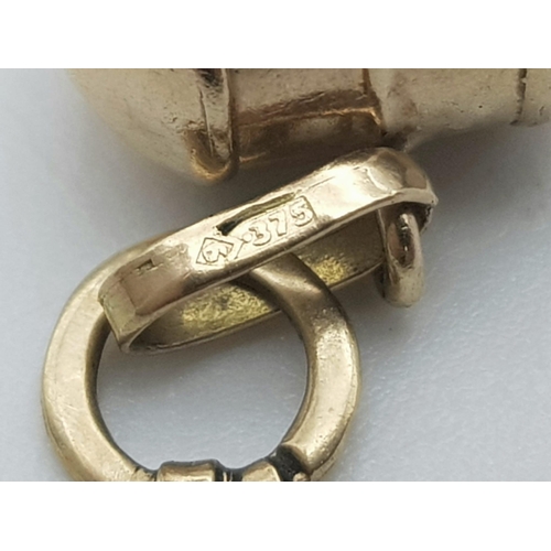 656 - A 9K YELLOW GOLD WHISTLE CHARM. TOTAL WEIGHT 0.8G