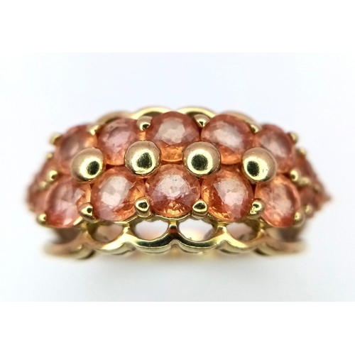 716 - A 9K GOLD  DRESS RING WITH UNUSUAL COLOURING .  4.9gms   size P