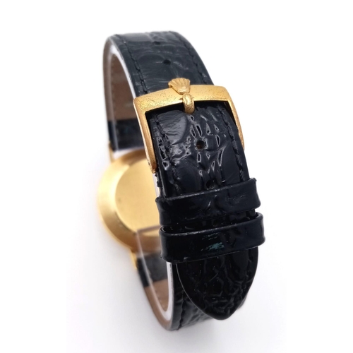 757 - A Vintage 18K Gold and Diamond Cased Rolex Cellini Gents Watch. Black leather strap. 18k gold and di... 