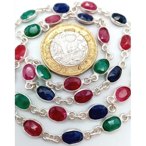 758 - A Ruby, Emerald and Sapphire Chain Necklace. 46cm. 14.3g weight. CD - 1148