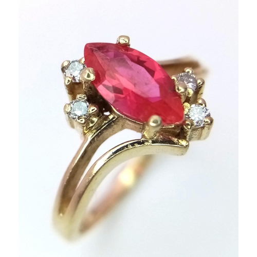 821 - A 14K GOLD RUBY AND DIAMONDS DESIGNER RING .   3.1gms   size M