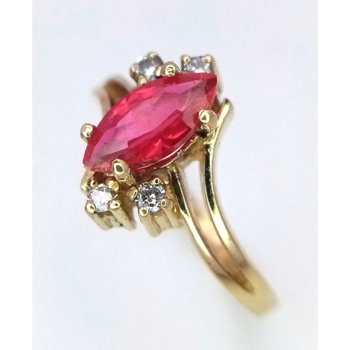 821 - A 14K GOLD RUBY AND DIAMONDS DESIGNER RING .   3.1gms   size M