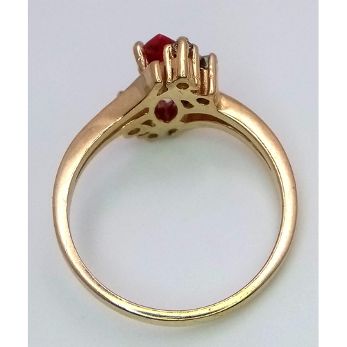 821 - A 14K GOLD RUBY AND DIAMONDS DESIGNER RING .   3.1gms   size M