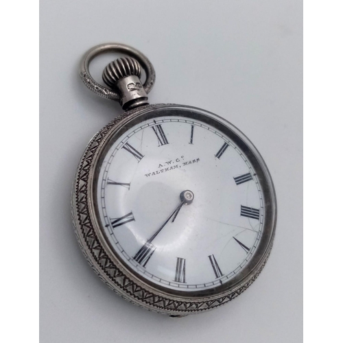 880 - An Antique Miniature Sterling Silver A.W. Waltham Pocket Watch. Top winder. In working order but bec... 