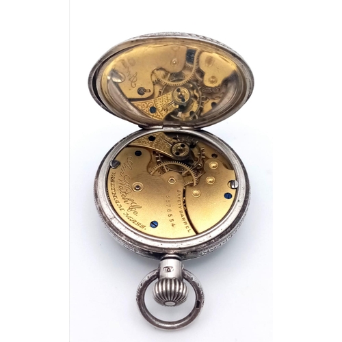 880 - An Antique Miniature Sterling Silver A.W. Waltham Pocket Watch. Top winder. In working order but bec... 