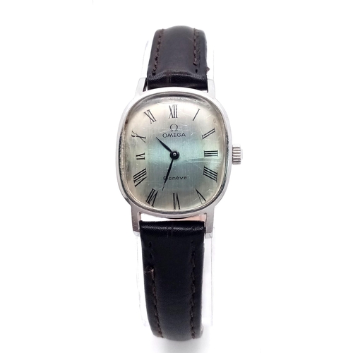 887 - A Vintage Omega Geneve Mechanical Ladies Watch. Black leather strap. Oval case - 21mm width. Aged me... 