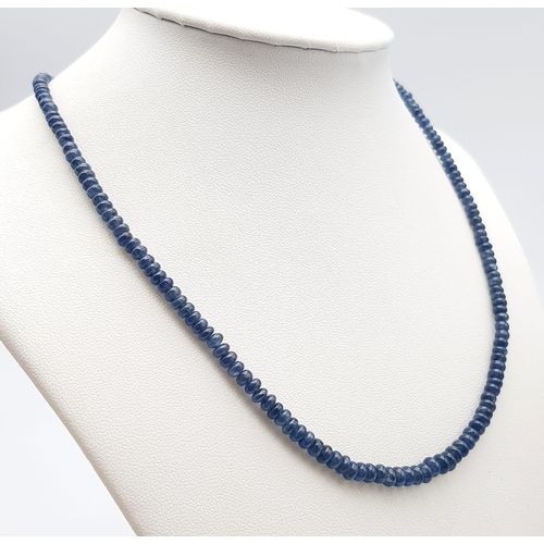 963 - A 90ct Blue Sapphire Small Rondelle Bead Necklace with an Emerald Clasp - set in 925 Silver. 42cm le... 