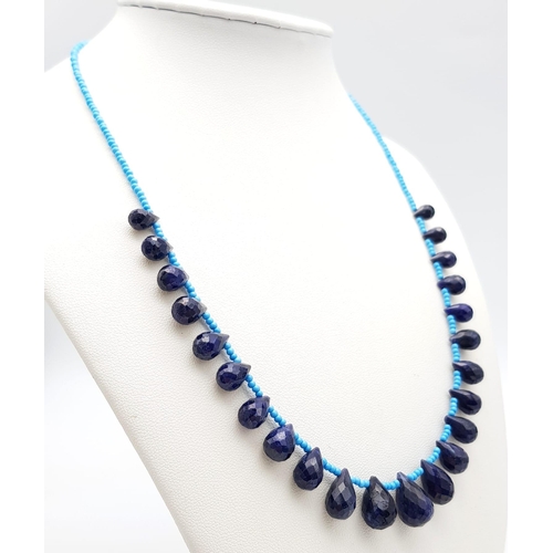 970 - A 113ct Blue Sapphire Tear Drop Necklace with Blue Turquoise Beads. 42cm length. Ref: CD-1139