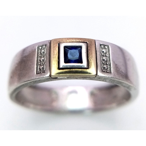 991 - A 925 Silver Blue Stone Gents Ring. Size U.