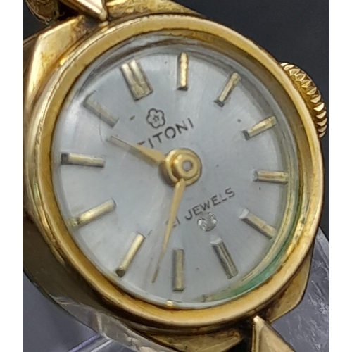 1626 - A Vintage 21 Jewel Titoni Ladies Watch. Expandable gilded strap. Two tone (rolled gold) case - 15mm.... 