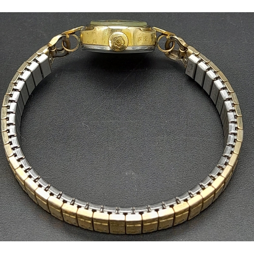 1626 - A Vintage 21 Jewel Titoni Ladies Watch. Expandable gilded strap. Two tone (rolled gold) case - 15mm.... 