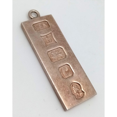 1536 - A vintage sterling silver ingot pendant (2X5cm). Full Birmingham hallmarks, 1977. Total weight 28G.