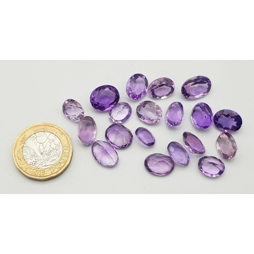 1122 - A Parcel of 19 Amethysts. Oval Cuts, up to 1.2cm Length. 52.39 Carats Total.