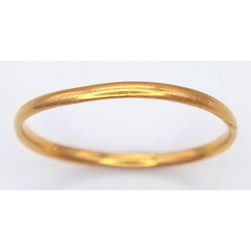 617 - A SLIMLINE 22K GOLD BAND RING .  1.3gms   size P