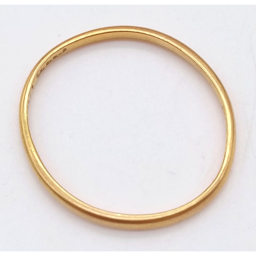 617 - A SLIMLINE 22K GOLD BAND RING .  1.3gms   size P