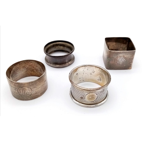 1810 - A collection of 4 Antique sterling silver napkin holders with different designs. Full Birmingham hal... 