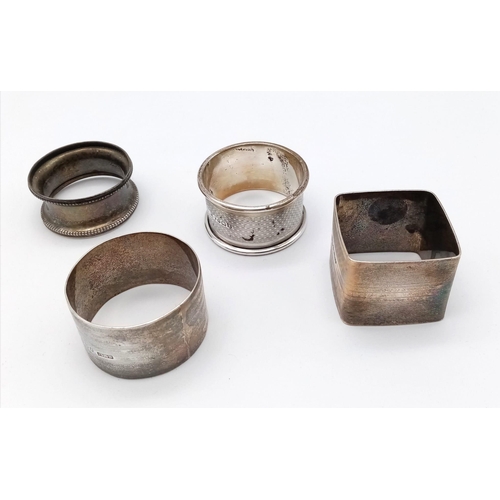 1810 - A collection of 4 Antique sterling silver napkin holders with different designs. Full Birmingham hal... 