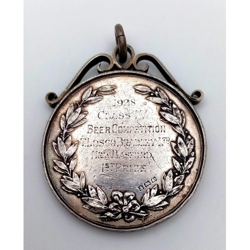 1803 - An Antique 1st prize sterling silver medal dated 1928 in the beer competition awarded to T.Losco Bra... 