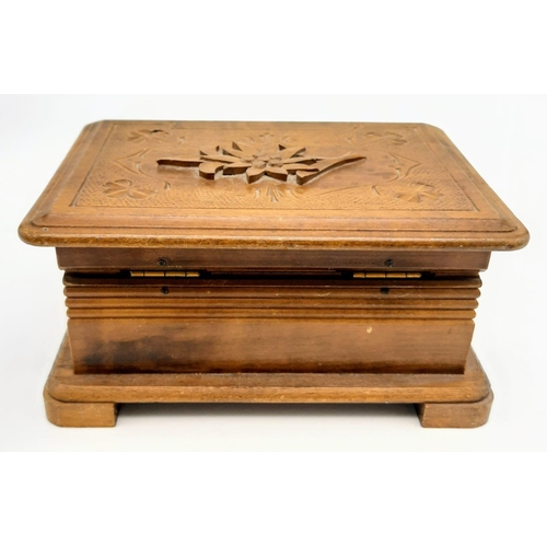 1069 - A Vintage Musical Decorative Wooden Trinket Box. Winder on base. In working order. 14cm x 10cm.