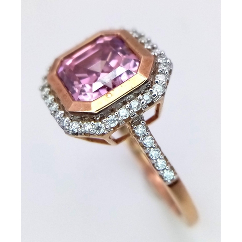 1077 - A 9K ROSE GOLD DIAMOND & PINK STONE RING. TOTAL WEIGHT 3G. SIZE N 1/2