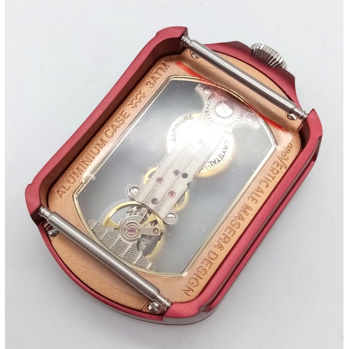 1090 - A VERTICALE DOUBLE SKELETON WATCH WITH TOP WINDER  AND ON A LEATHER STRAP