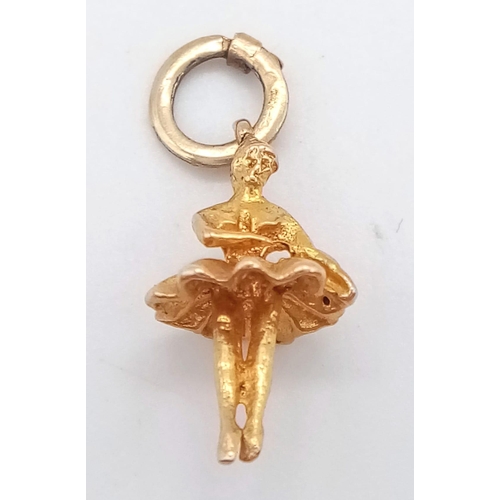 1105 - A 9K YELLOW GOLD BALLERINA CHARM. TOTAL WEIGHT 0.6G