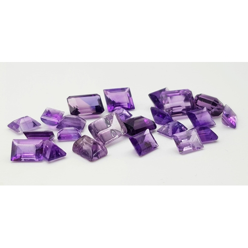 1109 - A Parcel of 24 Amethysts. Rectangle Cuts, Assorted Sizes. 32.1 Carats Total.