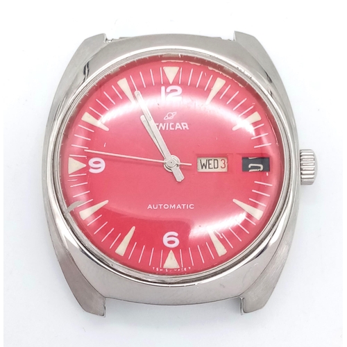 1187 - AN ENICAR AUTOMATIC GENTS WATCH WITH RED DIAL ,DAY AND DATE BOX  .... NO STRAP .   36mm