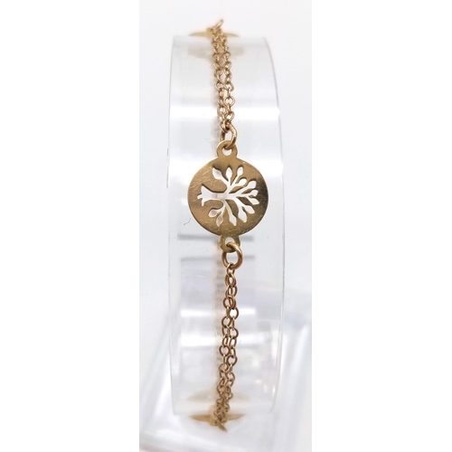 646 - An 18K Yellow Gold Tree of Life Bracelet. 16cm. 2.2g weight.