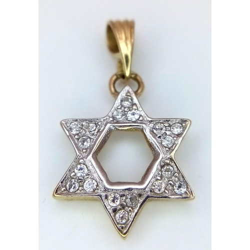 806 - A Diamond Encrusted Star of David pendant. 3cm