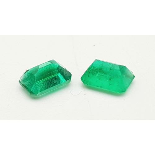 975 - Two Rectangle Cut Colombian Emeralds. 0.89 and 0.91 Carats (1.8 Carats Total).