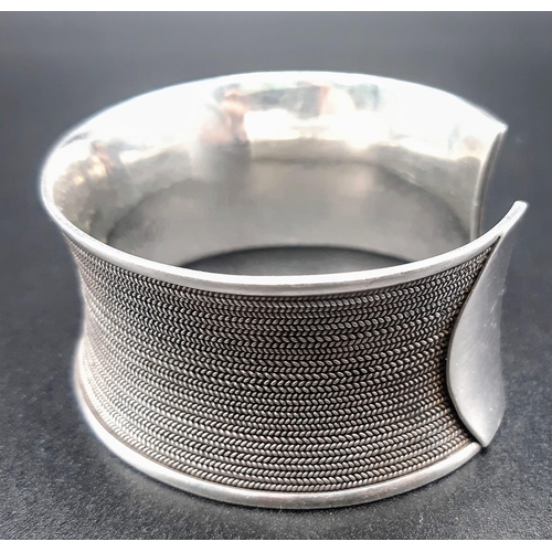 984 - A 925 Silver Wide Cuff Bangle. 3cm width. 55g weight.